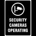 Security cameras operating signs